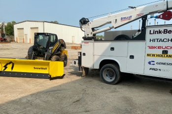 Field service truck, skid steer loader with SnowWolf snow