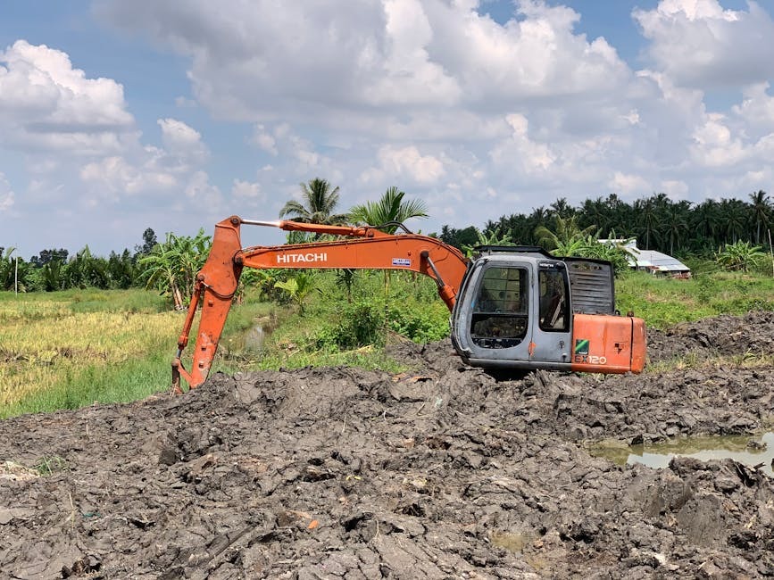 compact excavator digging in clay soil jobsite efficiency equipment selection