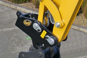 A Geith quick coupler on an excavator arm