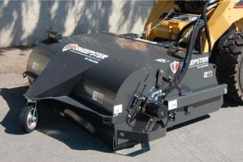 A broom on the front of a skid steer