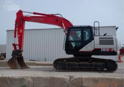 A Link-Belt excavator parked on concrete