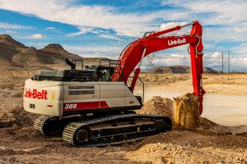 A Link-Belt 300 X4S excavator digging on a dirt site